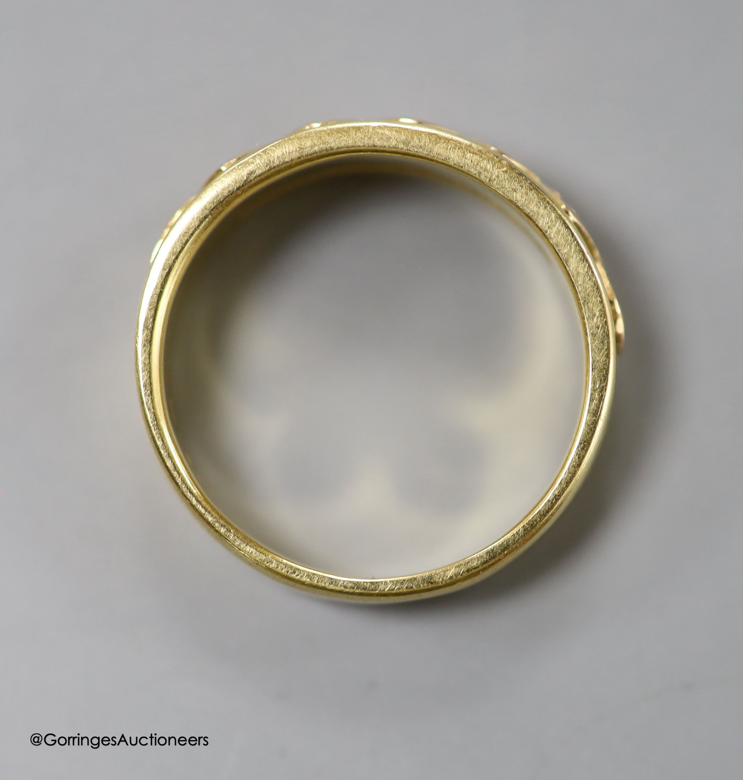 An 18ct gold five-stone diamond ring, gross 6.2g